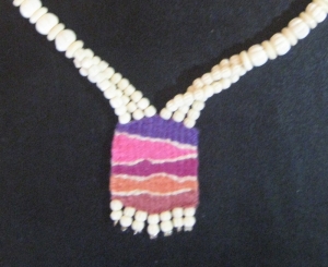 Loom woven pendant with bone beads